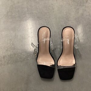 Black heels With clear straps never been worn